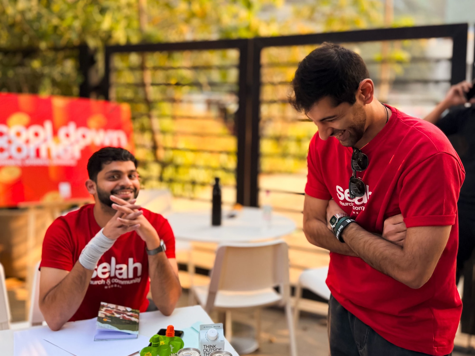 Friends talking at a Selah community day in Mumbai